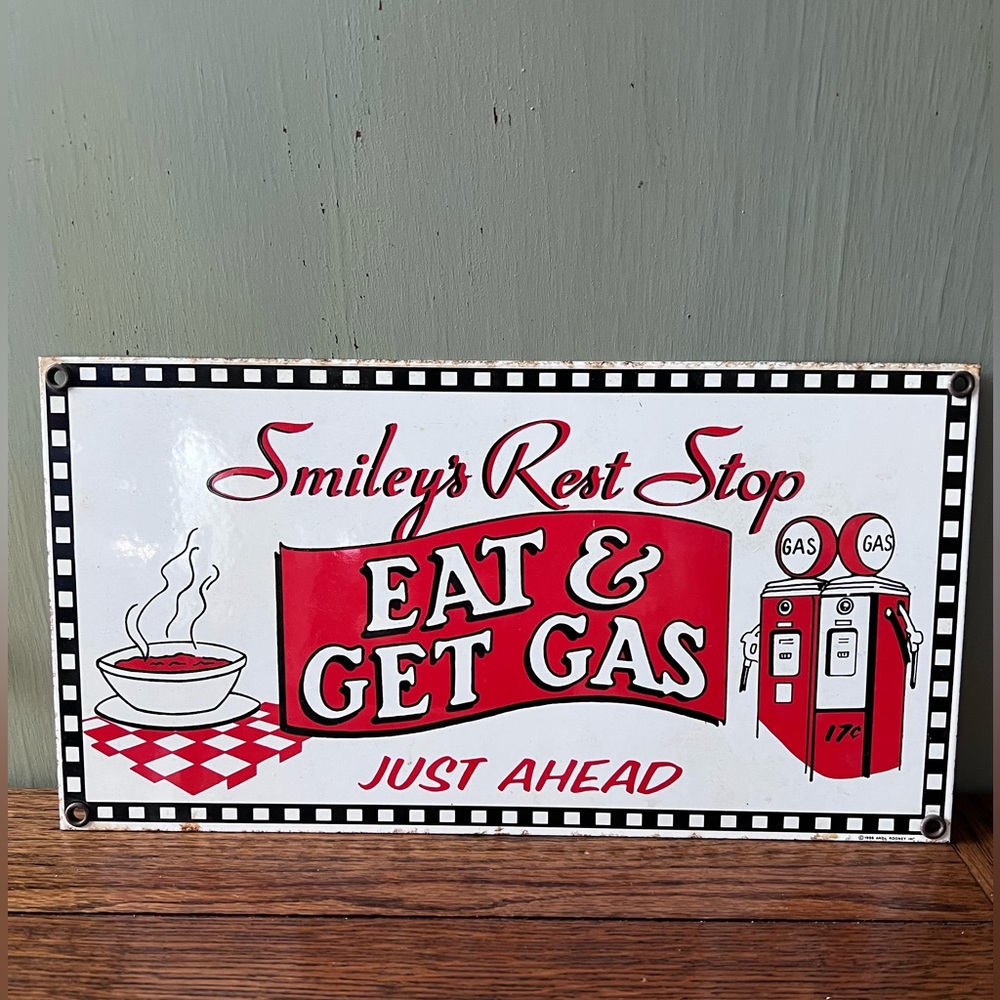 Ande Rooney Smiley’s Rest Stop Gas Porcelain Sign